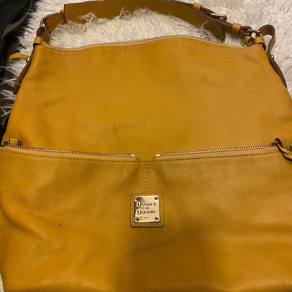 Mustard color Dooney and Bourke bag